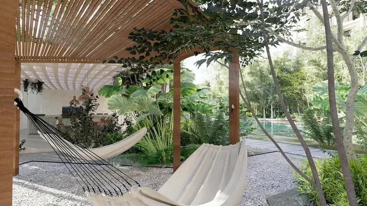 Área de hamacas entre árboles en Okün Living